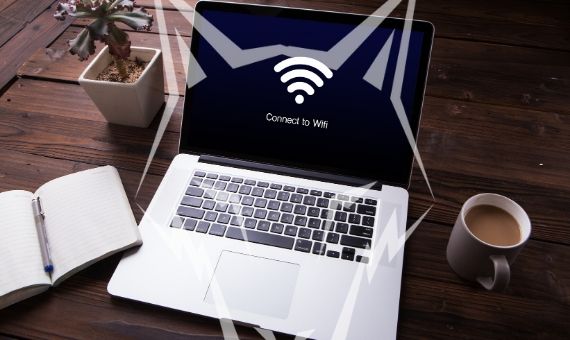Laptop, notebook and coffee cup
