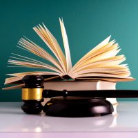 Gavel hammer and book with legally concept.